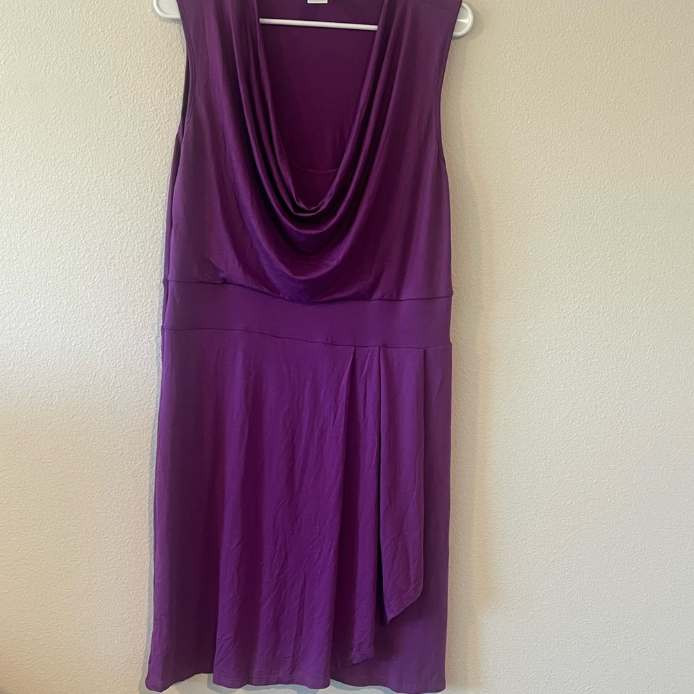 Mark. Purple dress